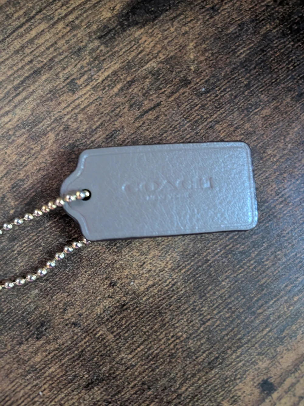 Coach leather tag